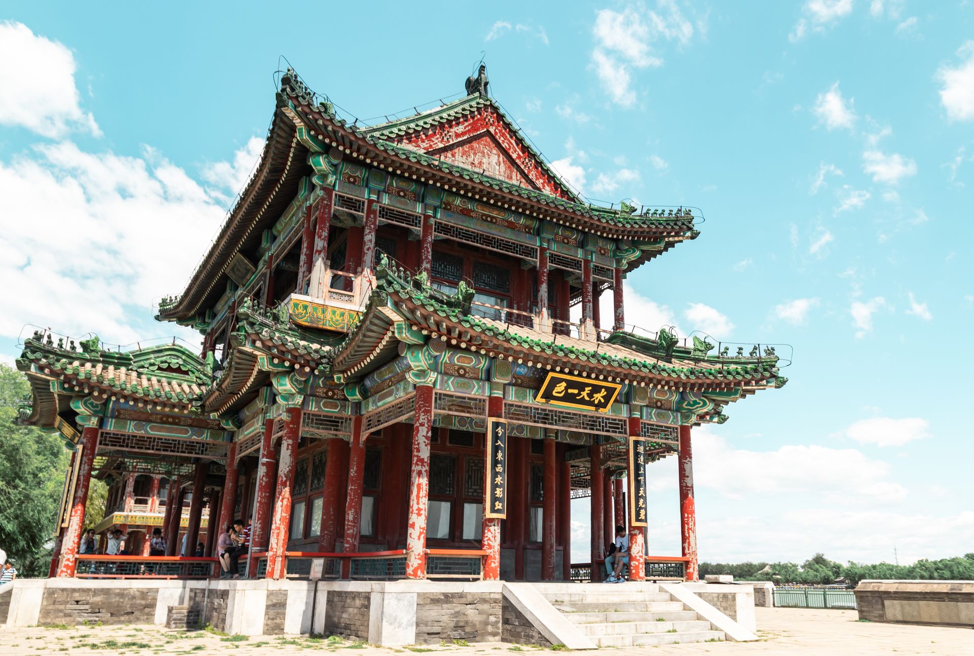 Stunning view of a traditional Chinese temple with ornate architecture and vibrant colors on a sunny day.