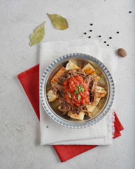 Agneau aux tomates et aux épices douces