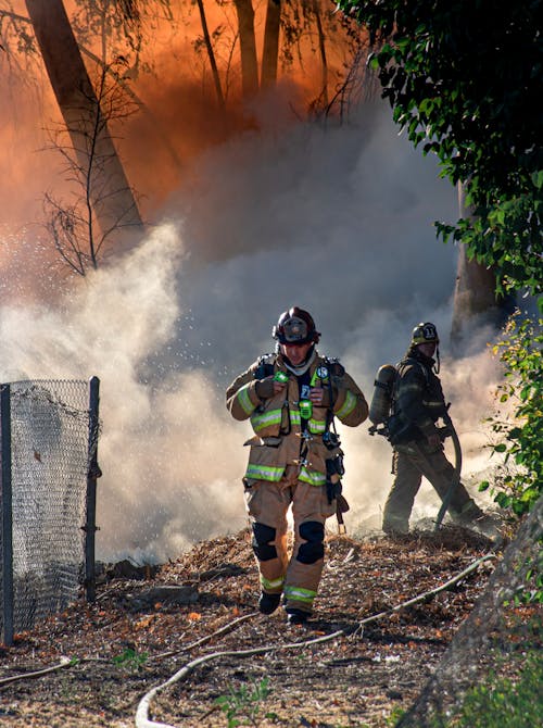 Fireman Walking on Pathway