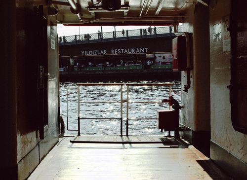 Free Inside ferry view towards Yildizlar Restaurant and bridge in daylight. Stock Photo