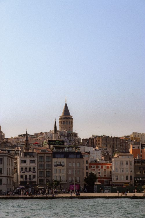 Free Scenic view of Galata Tower in Istanbul with historic architecture and clear skies. Stock Photo