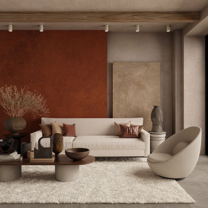 Ivory bouclé sofa in a warm plaster living room. Photo by Puscas Adryan on Pexels