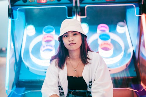 Selective Focus Photography of Woman Wearing White Bucket Hat