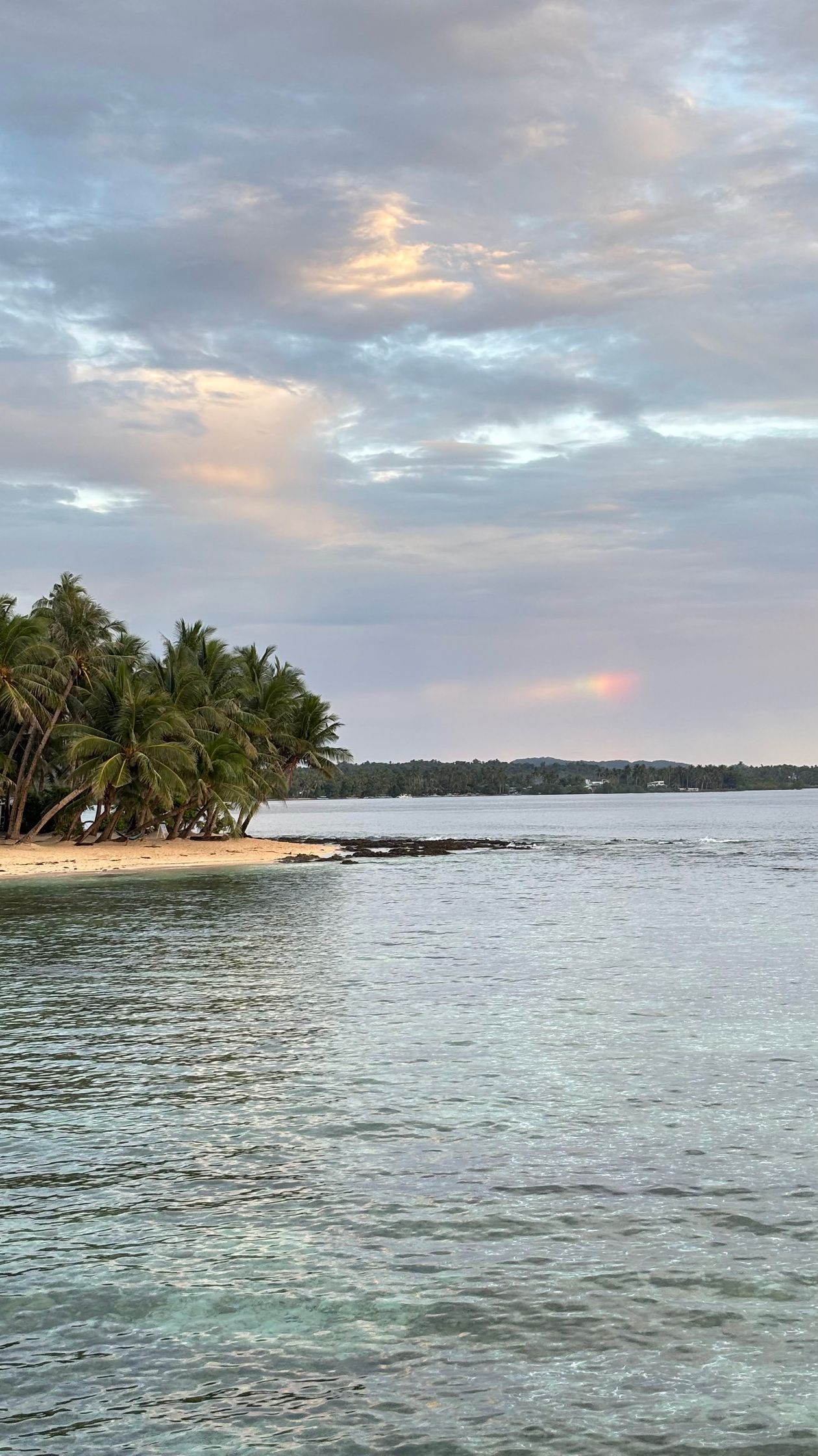 Tropical beach sunset in Caraga, Philippines