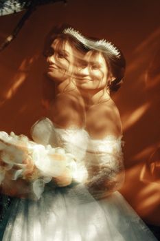 Creative double exposure shot of a bride with a bouquet, showcasing elegance and artistic style.