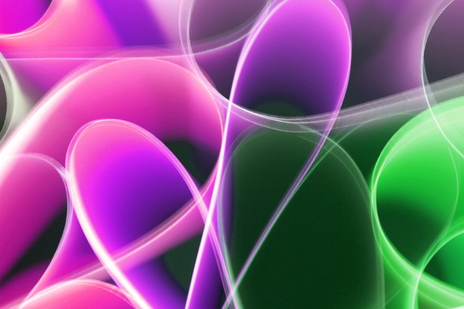 Vibrant abstract image featuring colorful light waves in a dynamic design.