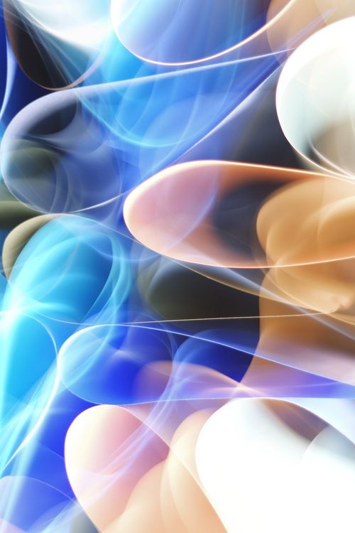 Free Vibrant abstract image featuring swirling light patterns in blue and orange hues. Stock Photo