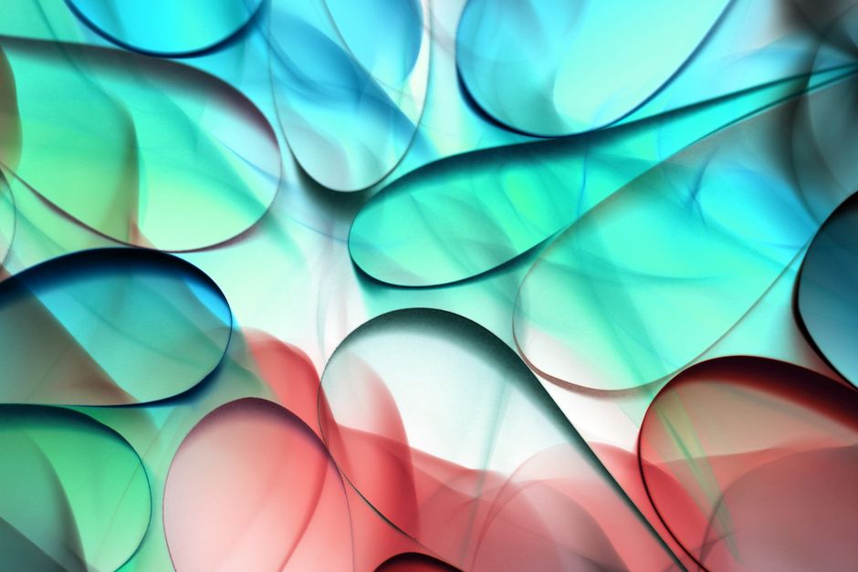 Vibrant abstract art with flowing shapes in red, green, and blue tones.