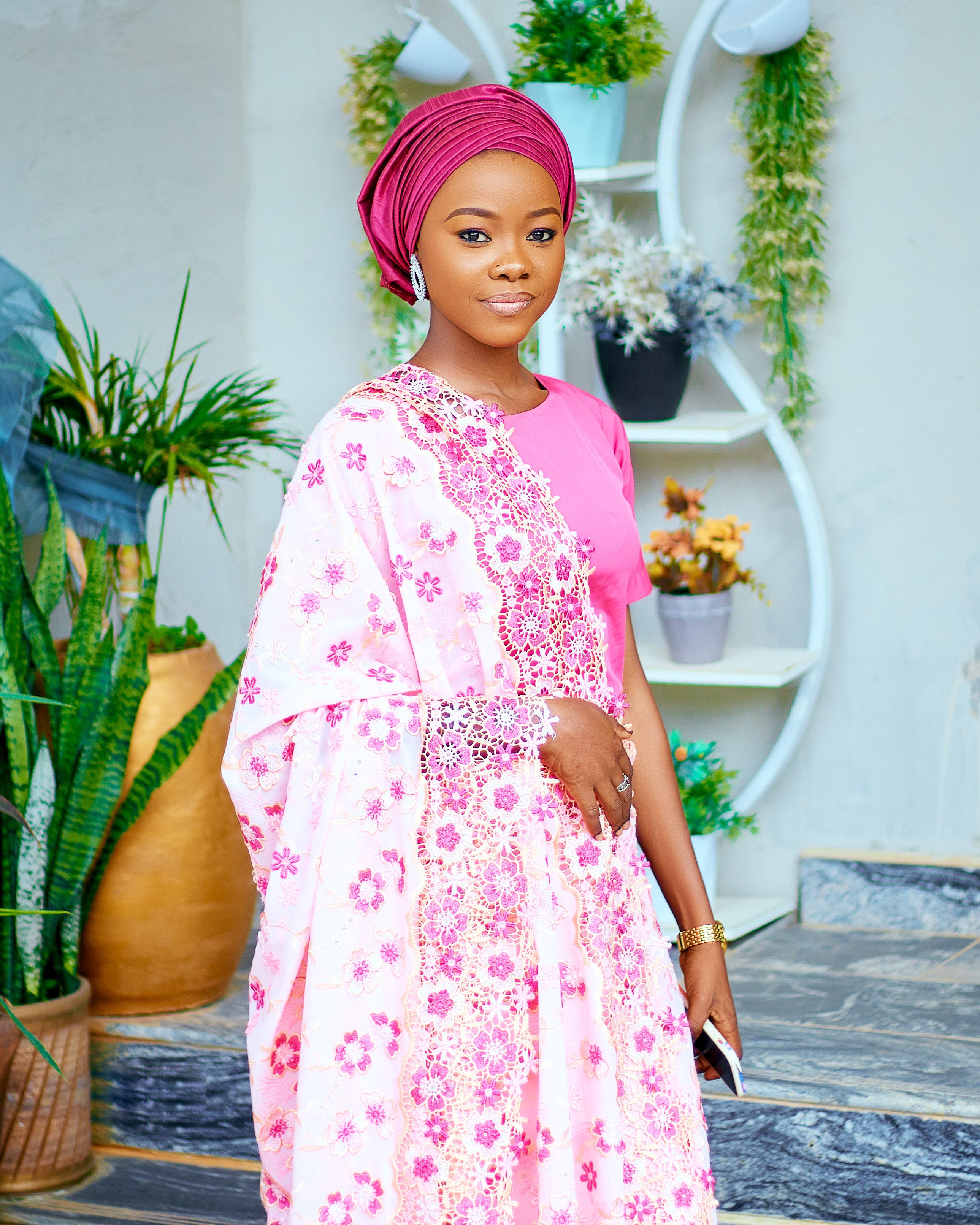 Elegant Woman in Traditional Pink Dress Indoors · Free Stock Photo