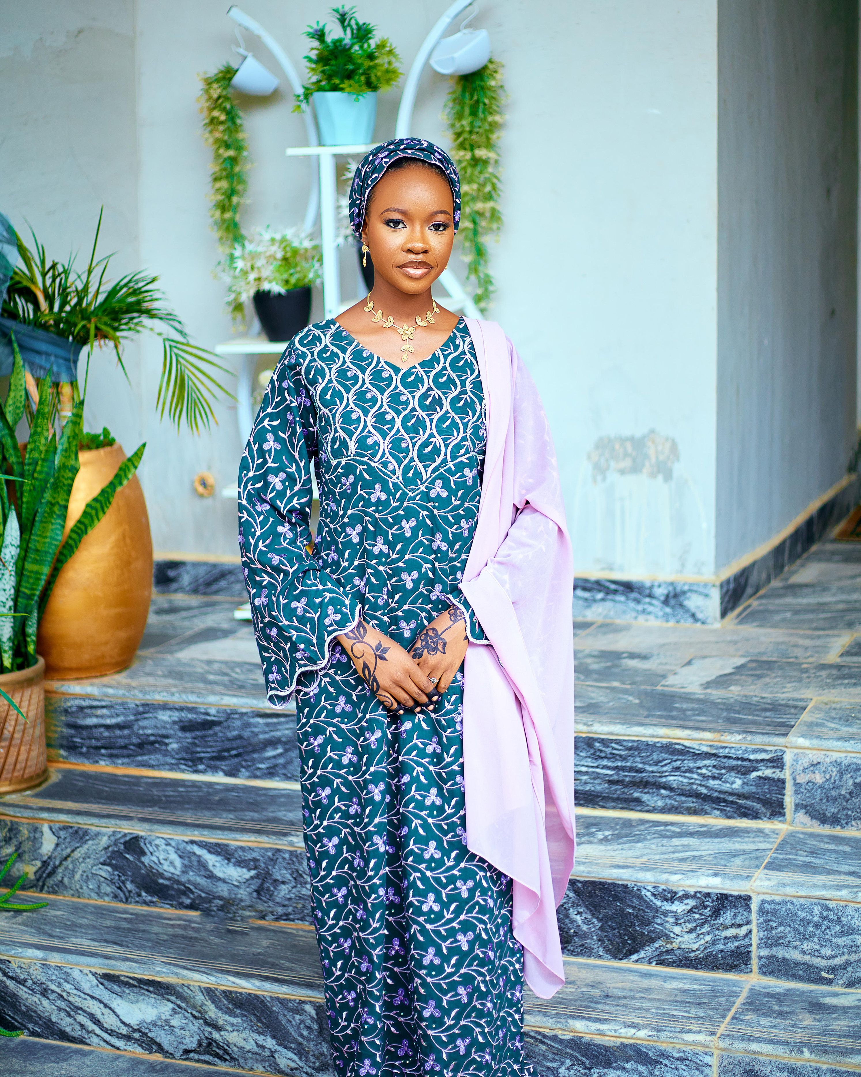 Elegant Woman in Traditional Attire Indoors · Free Stock Photo