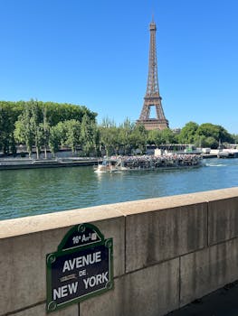 Stunning view of Eiffel Tower from Avenue de New York by the Seine River.