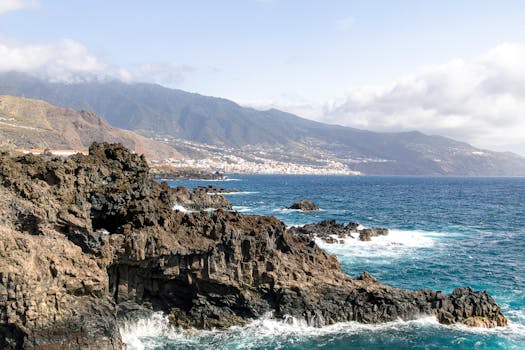 Explore the rugged coastline of La Palma with striking mountain and ocean views.