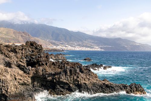 Free Explore the rugged coastline of La Palma with striking mountain and ocean views. Stock Photo
