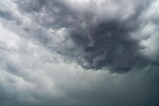 A dramatic capture of swirling storm clouds, showcasing nature's power and beauty.. dramatic, capture, swirling