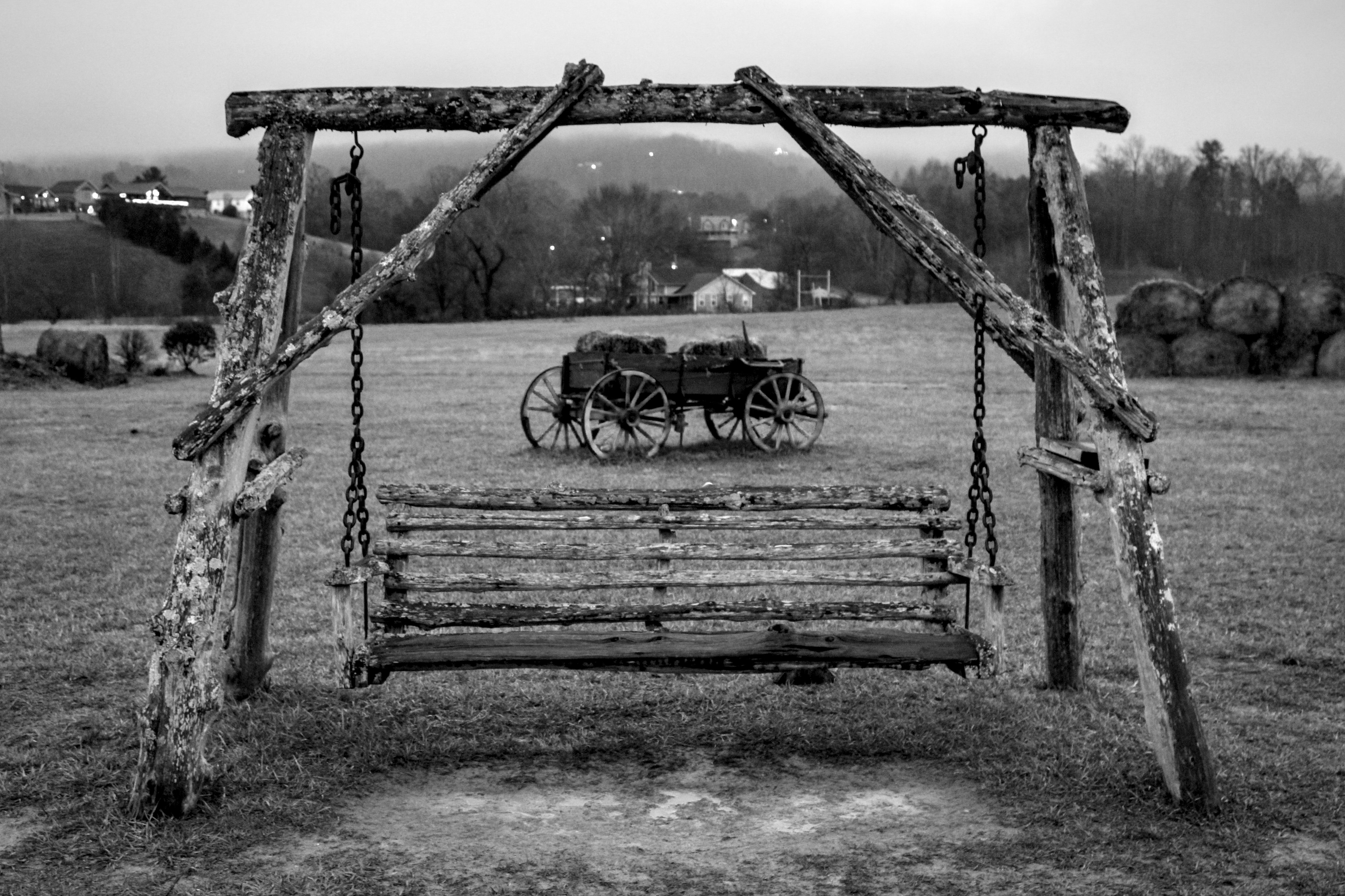 Rustic Wooden Swing in Countryside Landscape · Free Stock Photo