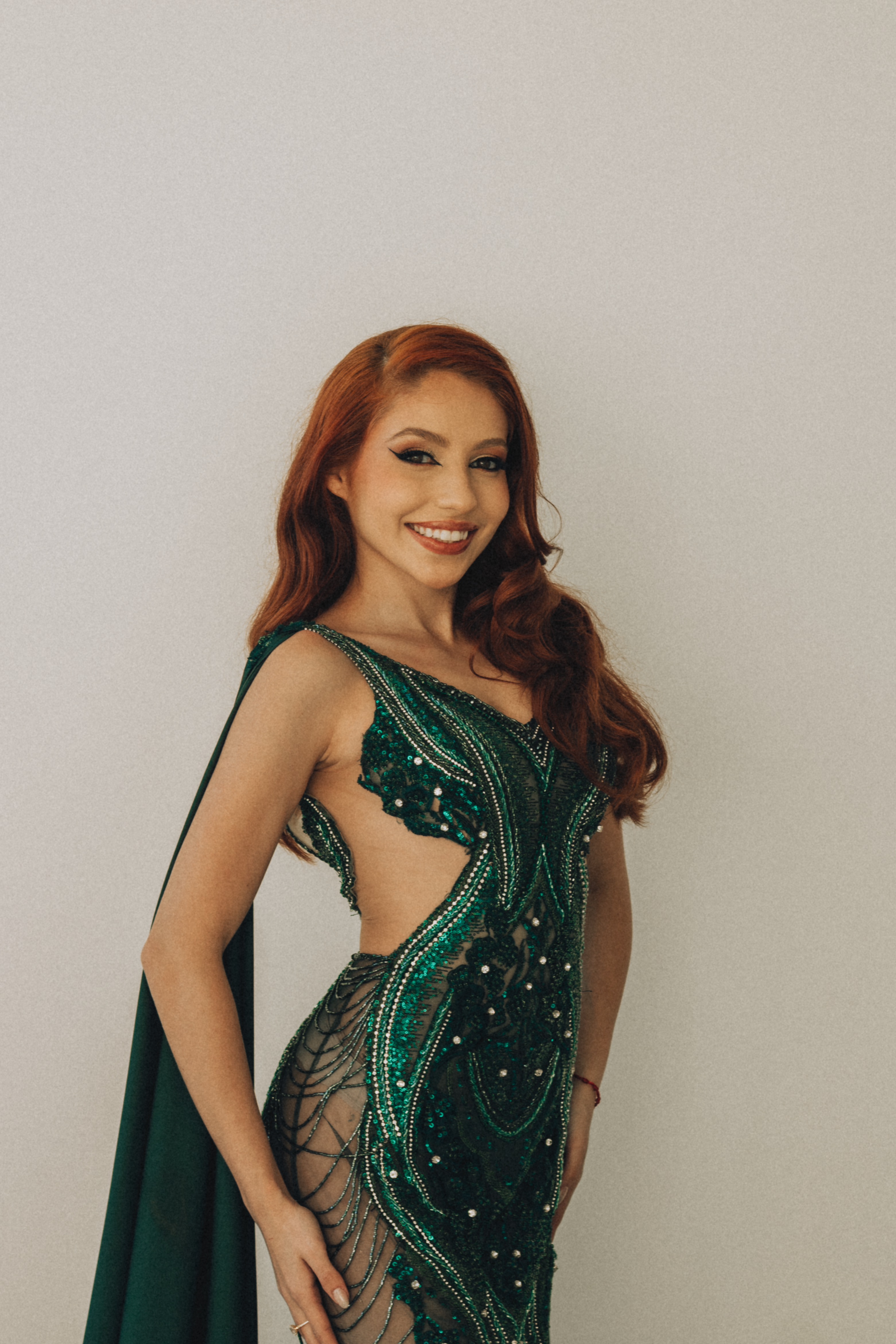 Beautiful Woman in Green Sequin Evening Dress  Free Stock Photo