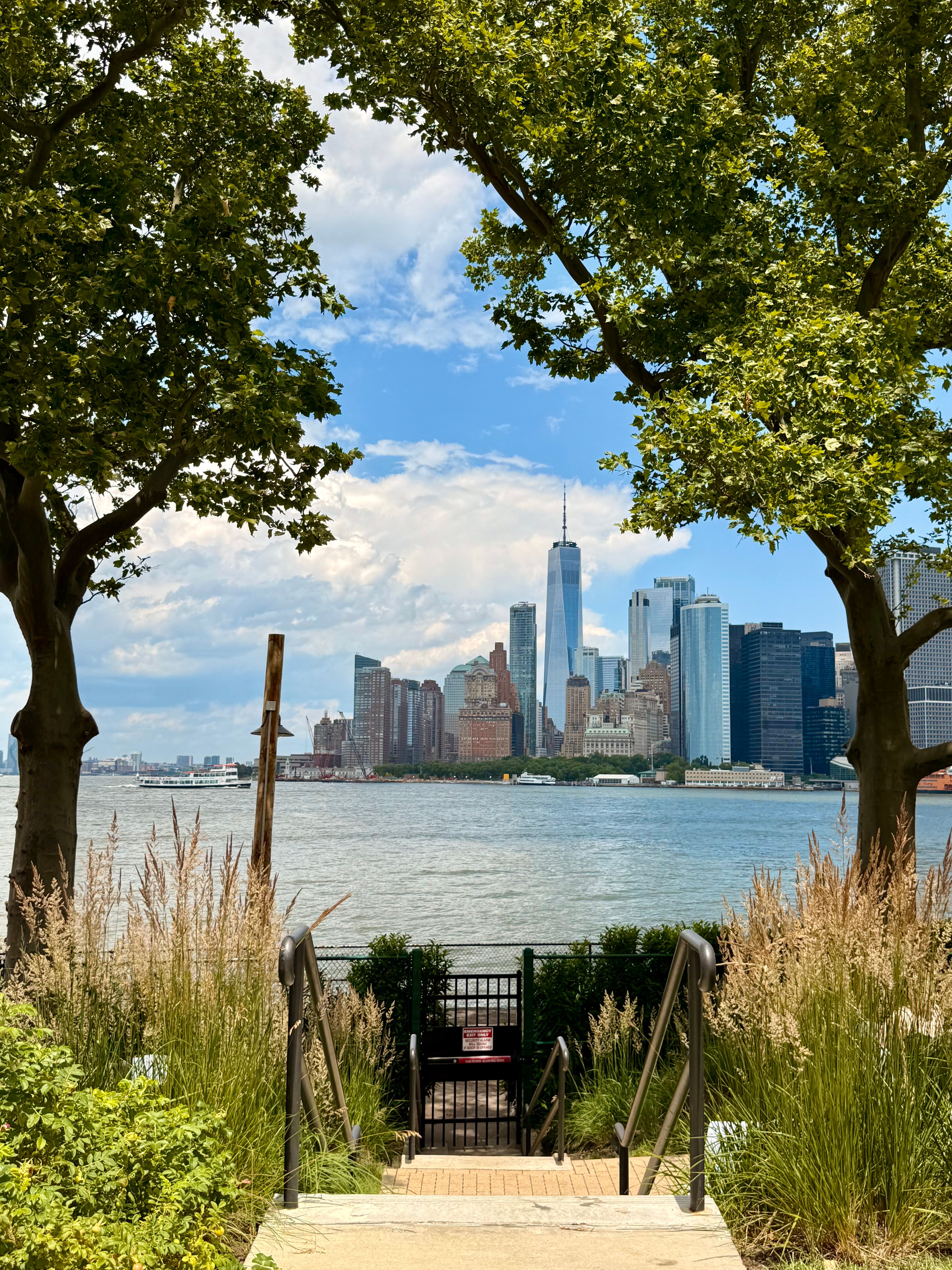 Scenic View of Manhattan Skyline from Garden · Free Stock Photo