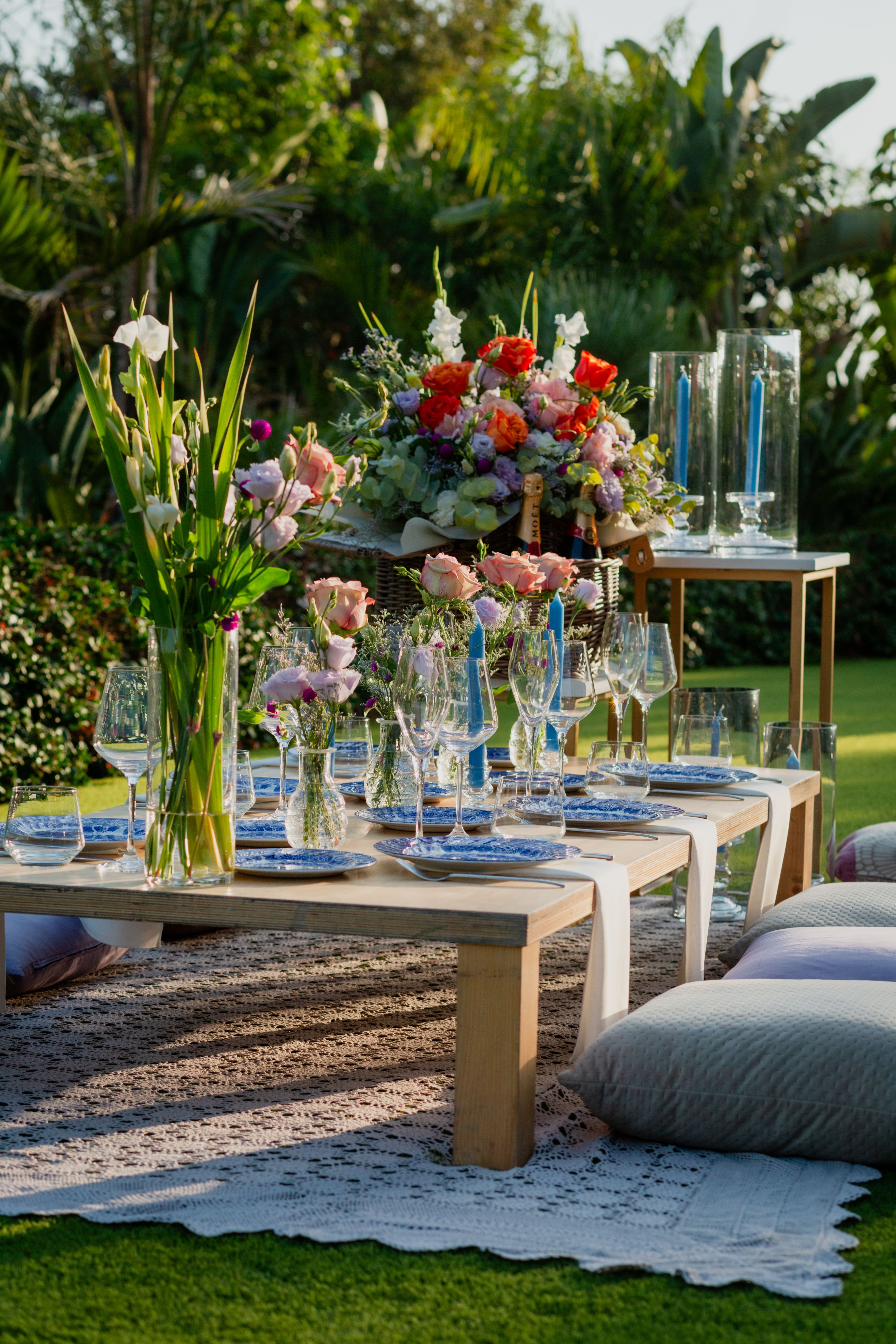 Elegant Outdoor Garden Dining Setup with Floral Decor · Free Stock Photo