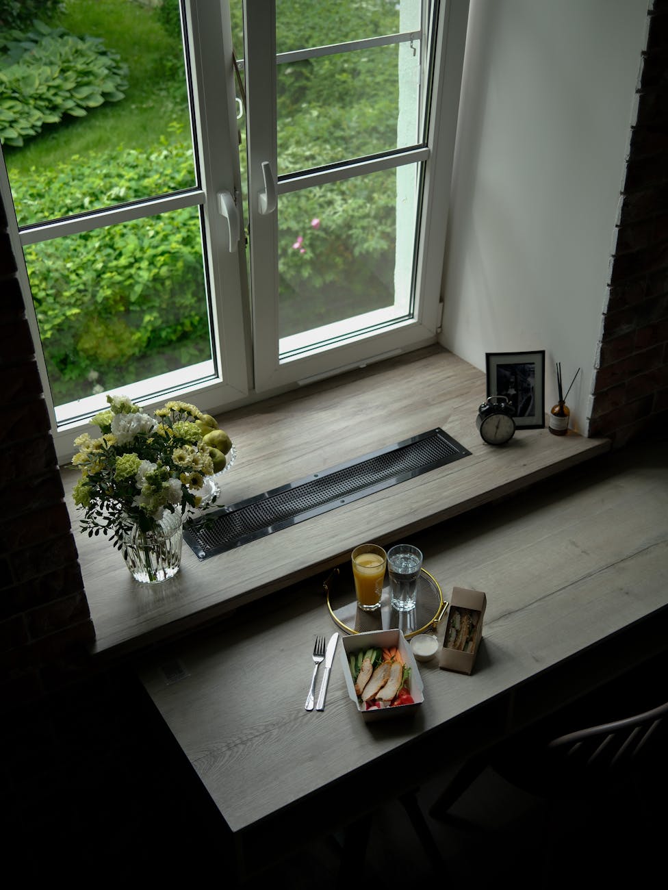 healthy indoor plants in natural light, UK home garden setting