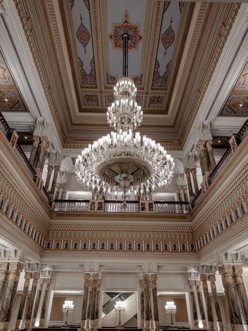 Free Elegant interior of an Ottoman-era palace in Istanbul featuring a grand chandelier. Stock Photo