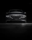 Sleek Genesis G80 Sedan in Dark Studio Setting