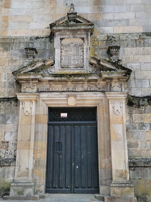 Free Close-up of a historic building facade in Galicia, Spain, showcasing detailed stone architecture. Stock Photo