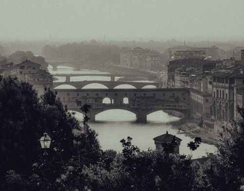 Free Vintage black and white view of Ponte Vecchio and Arno River in Florence, Italy. Stock Photo