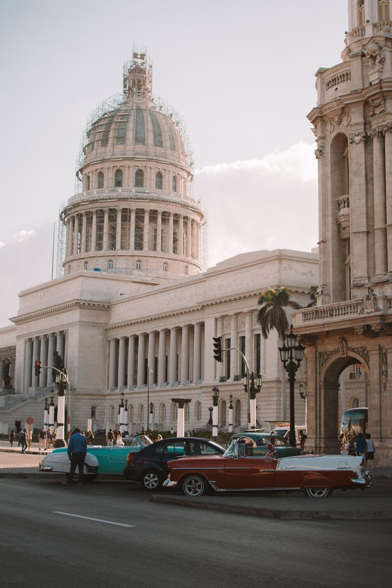 Classic cars parked in front of El Capitolio in Havana, Cuba