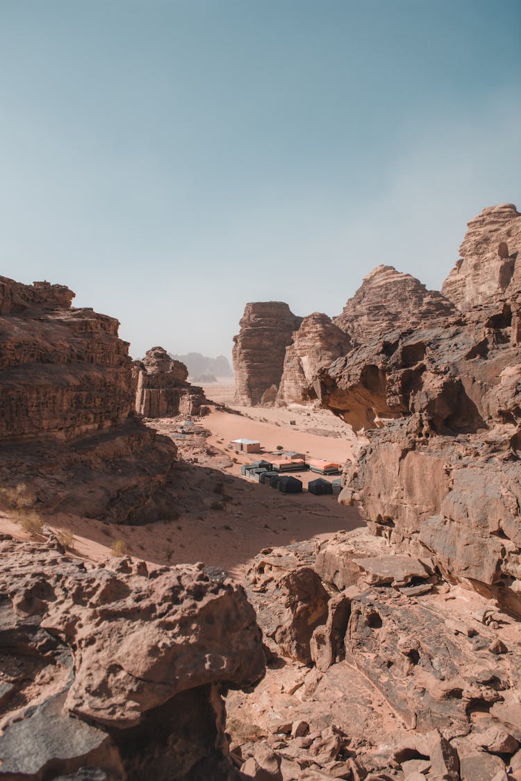 Structures Beside Rocks And Cliffs