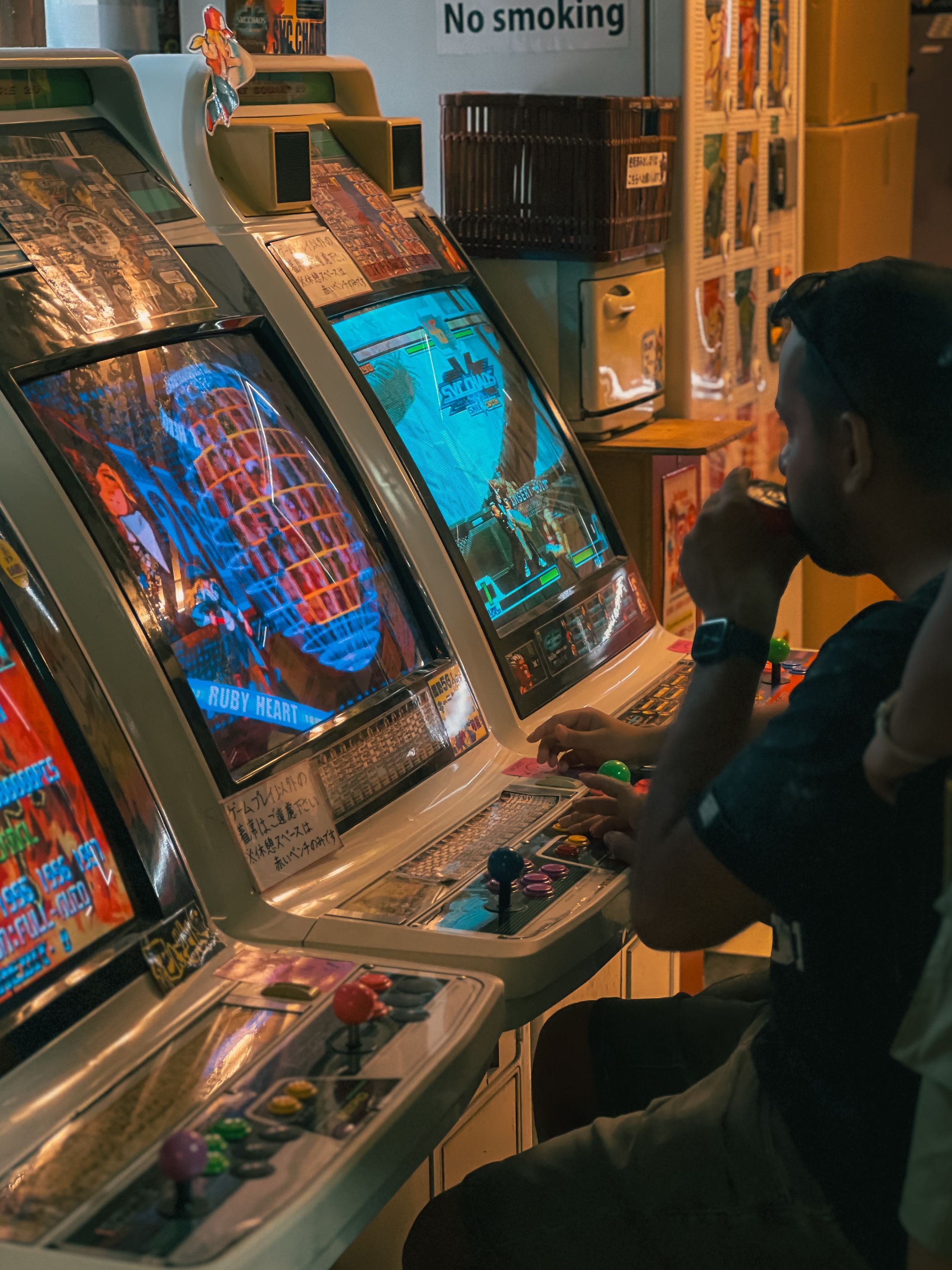 Player enjoying a retro arcade