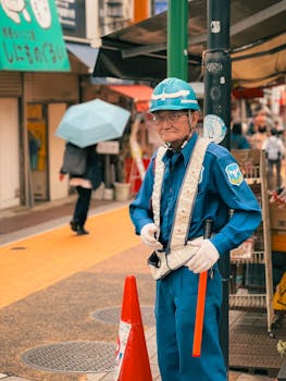 Urban street scene with a safety officer in uniform standing by. Vibrant city atmosphere.