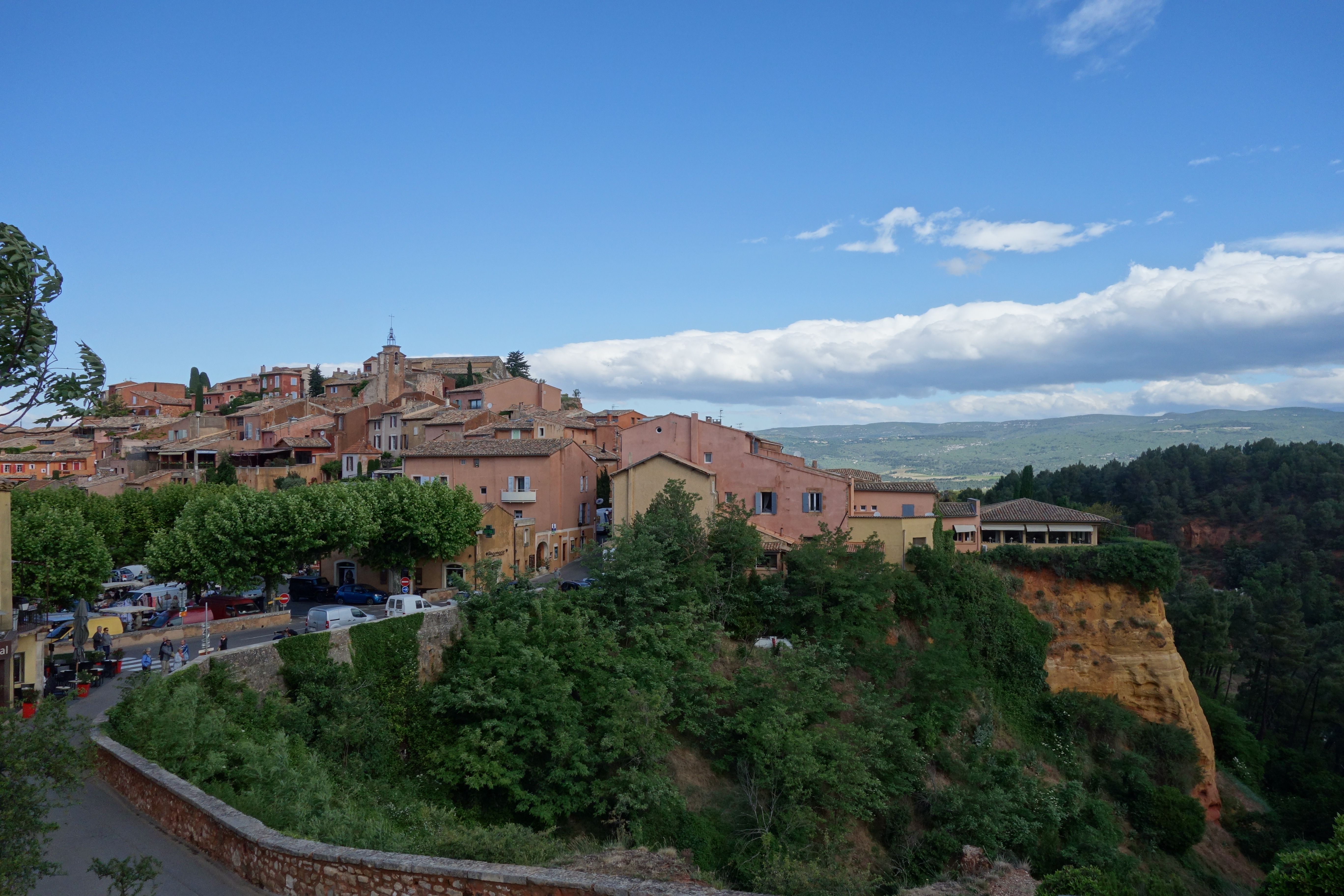 Picturesque view of Roussillon village and surrounding nature in Provence, France. Picturesque view of Roussillon village and surrounding nature in Provence, France.