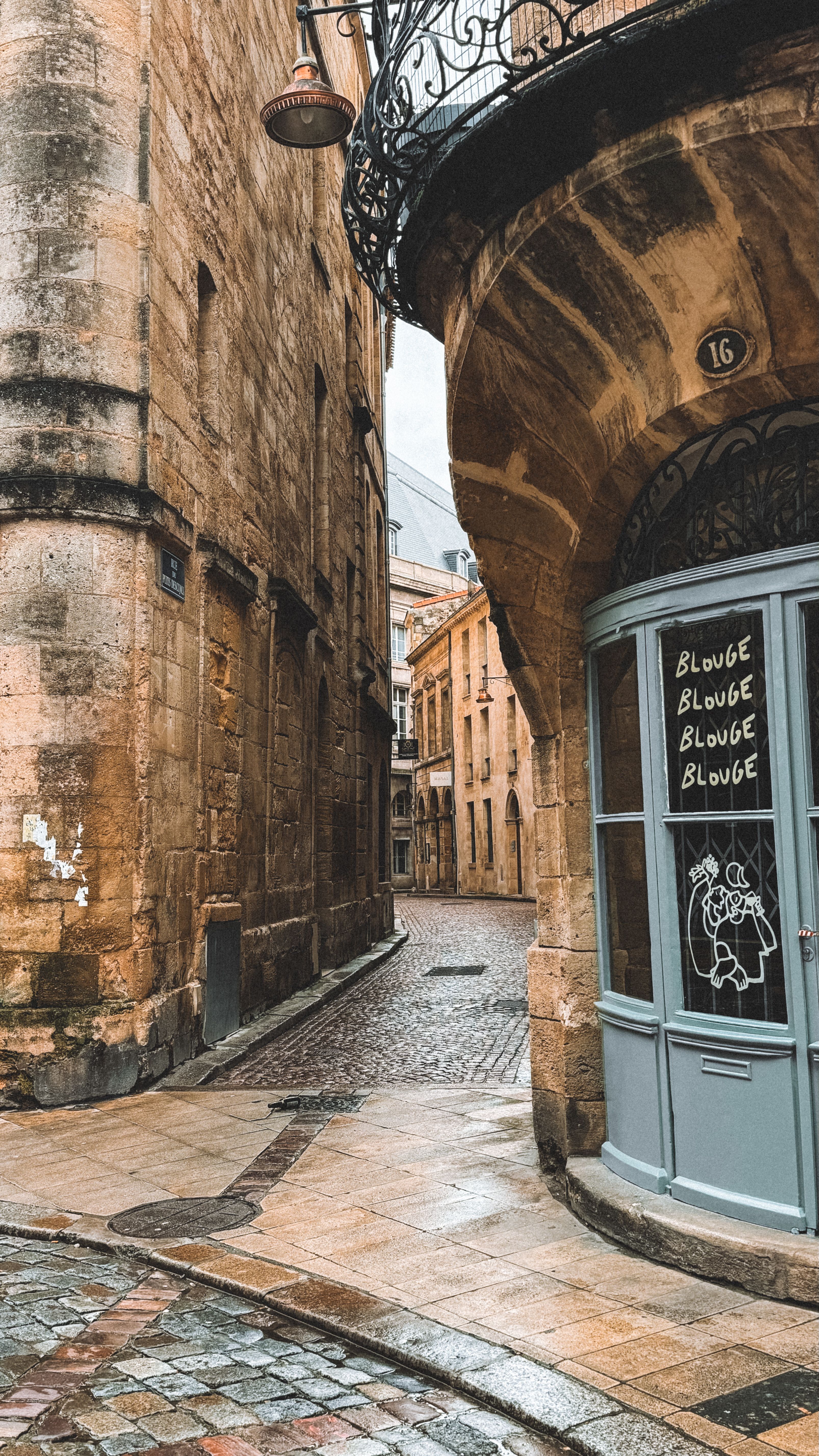 Charming cobblestone street in historic European town · Free Stock Photo