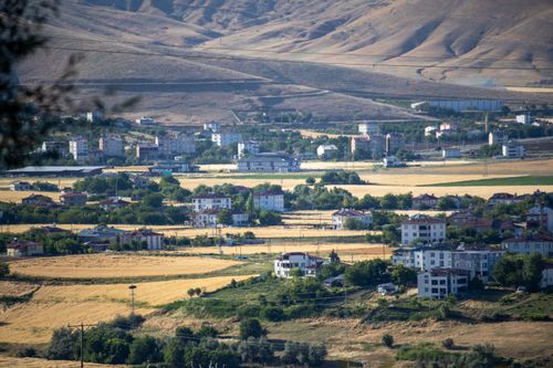 Free Aerial view of Kovancılar in Elazığ, Türkiye with rolling hills and farmland. Stock Photo