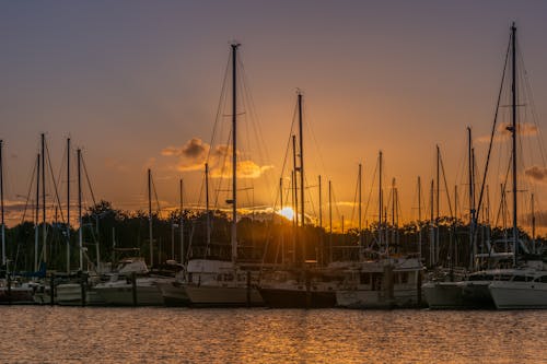 Free stock photo of sunset boats Stock Photo