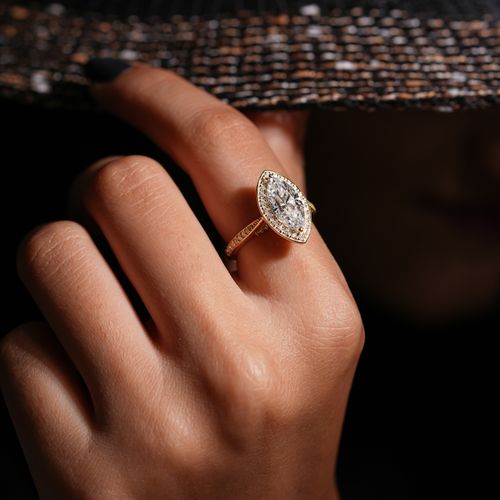 Free A stylish diamond ring adorns a young woman's hand, showcasing premium jewellery fashion. Stock Photo