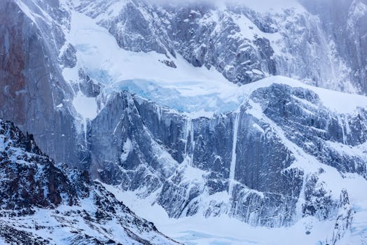 Snowy mountains and glaciers of Fitz Roy create a stunning winter landscape in Argentina. Perfect for nature lovers and travelers.