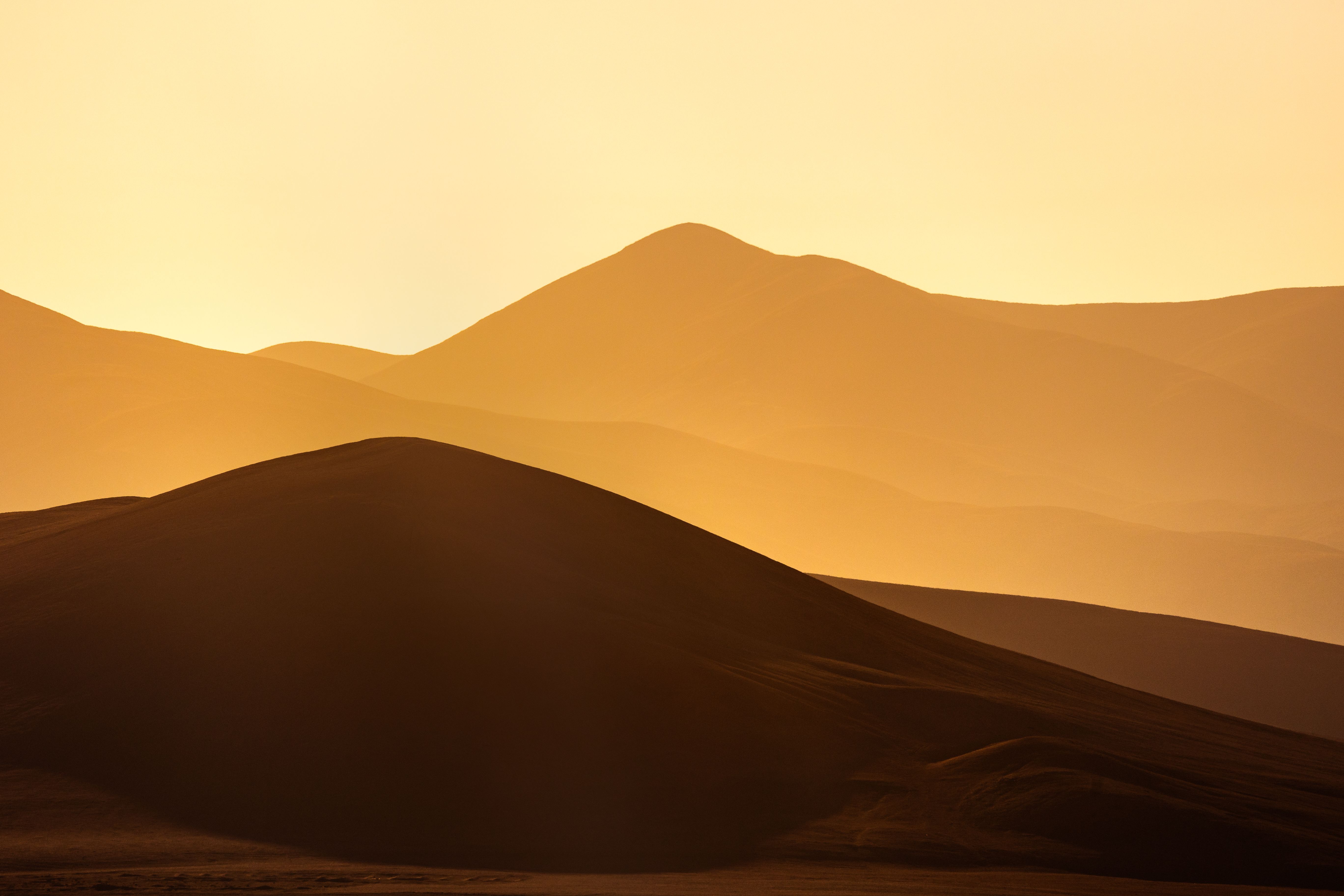 Beautiful golden dunes sweep across the Atacama Desert landscape in Chile, capturing the essence of tranquility and nature's artistry. Beautiful golden dunes sweep across the Atacama Desert landscape in Chile, capturing the essence of tranquility and nature's artistry.