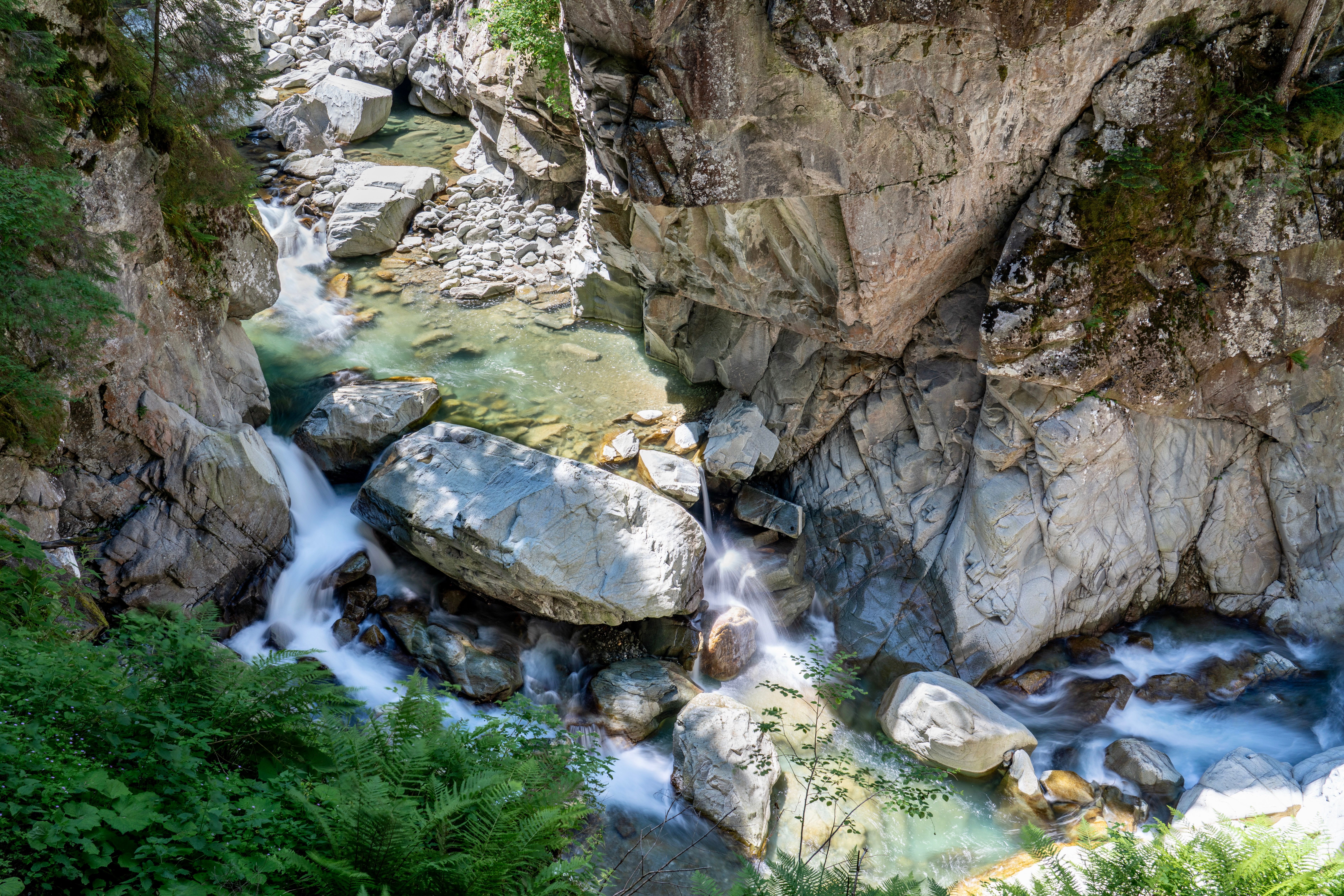 Scenic Rocky River Landscape with Cascading Water · Free Stock Photo