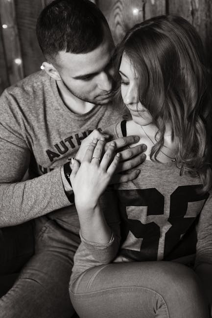 View of Couple Holding Hands