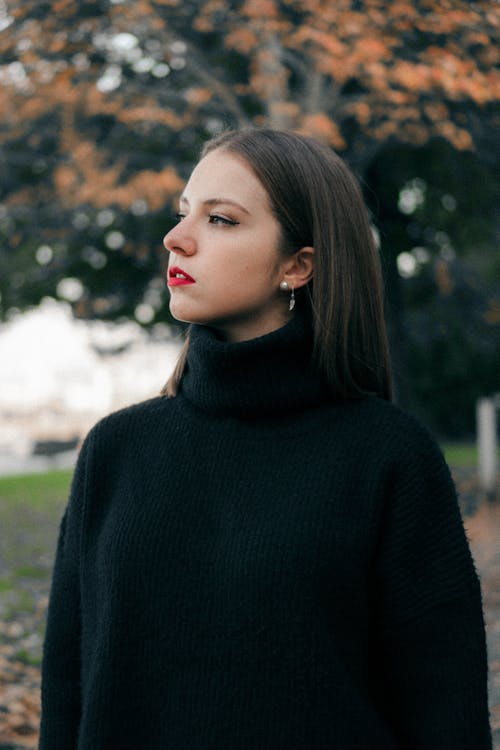 Selective Focus Photography of Woman Wearing Black Turtleneck Top