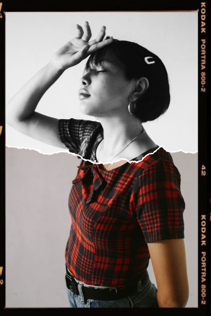 Creative portrait of a woman with a unique artistic effect, blending color and monochrome.