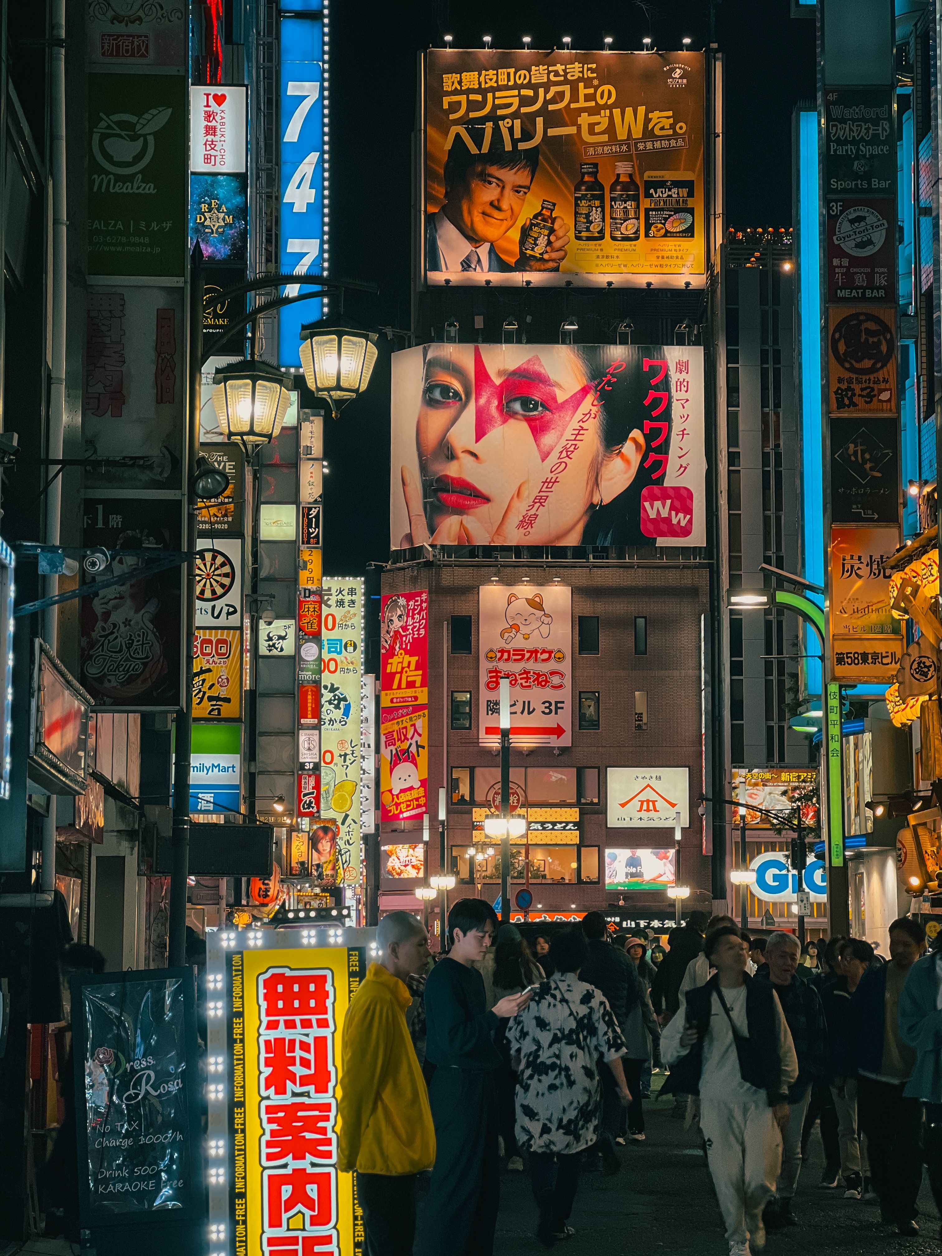 Vibrant Nightlife in Tokyo's Bustling Streets · Free Stock Photo