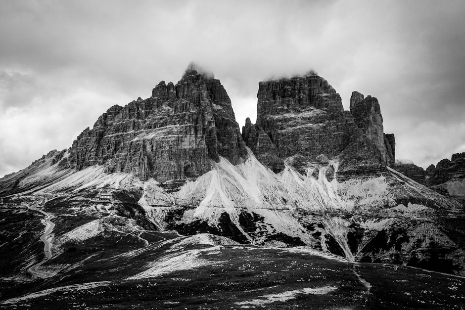 Stunning black and white view of the iconic Tre Cime di Lavaredo peaks in the Italian Dolomites.