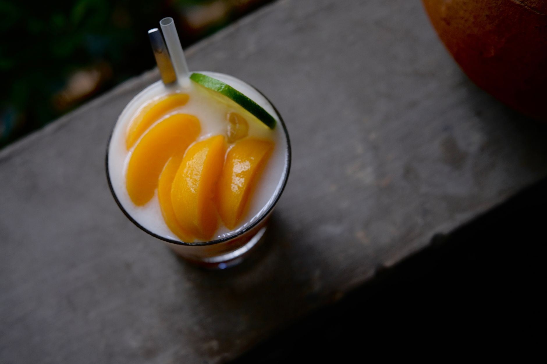 Peach on the Beach Cocktail served with lime garnish