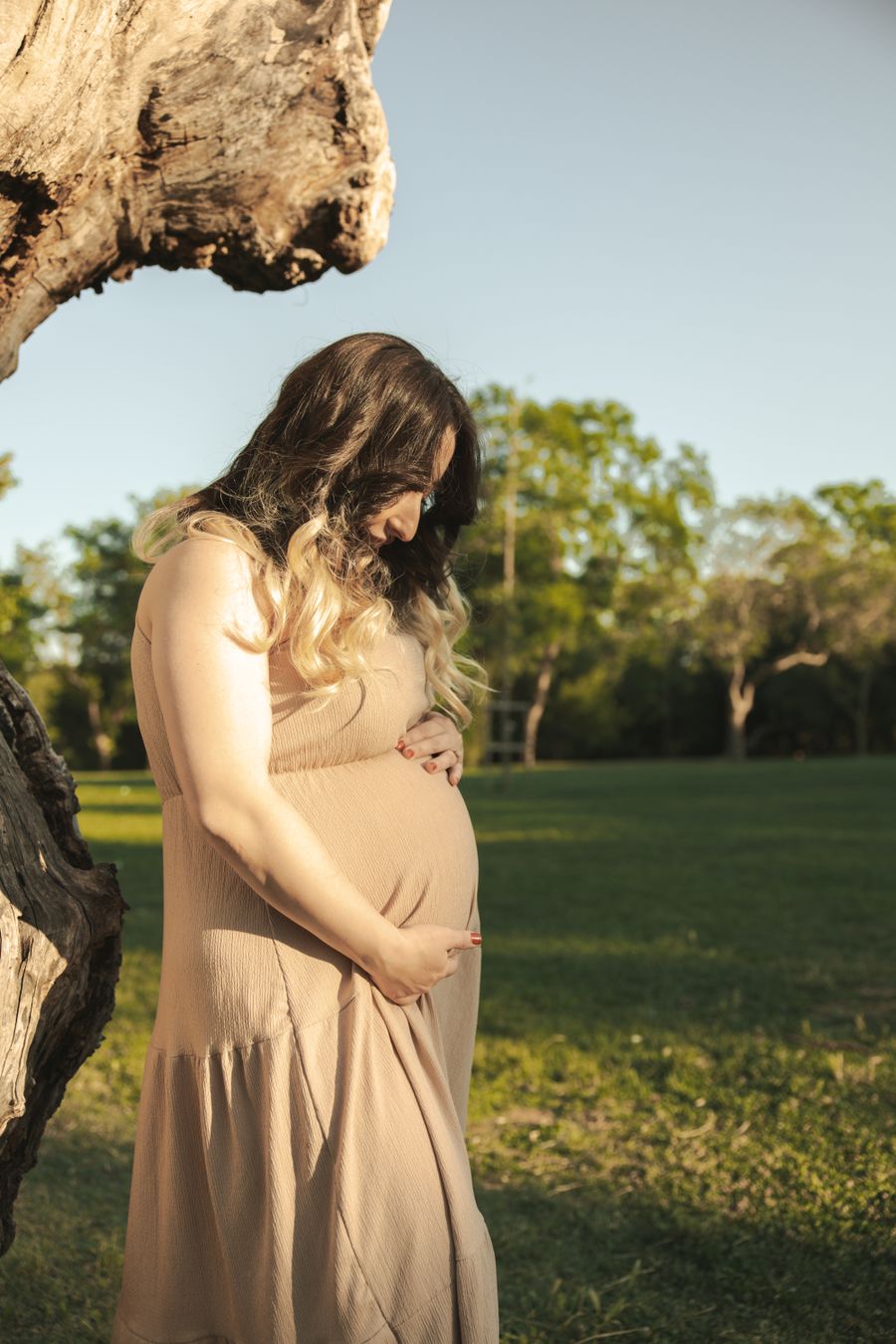 Maternity photography outdoors with soft natural light