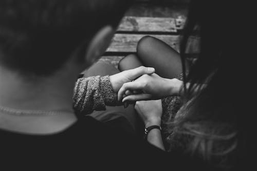 Close-up of Couple Holding Hands