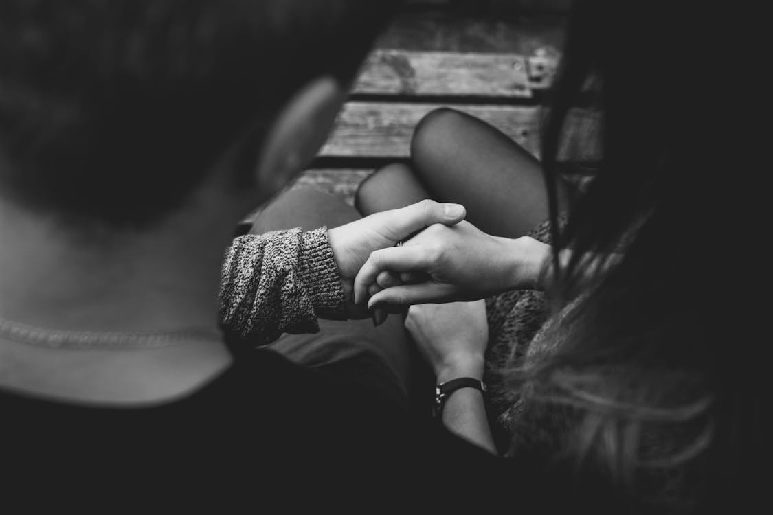 Free Close-up of Couple Holding Hands Stock Photo