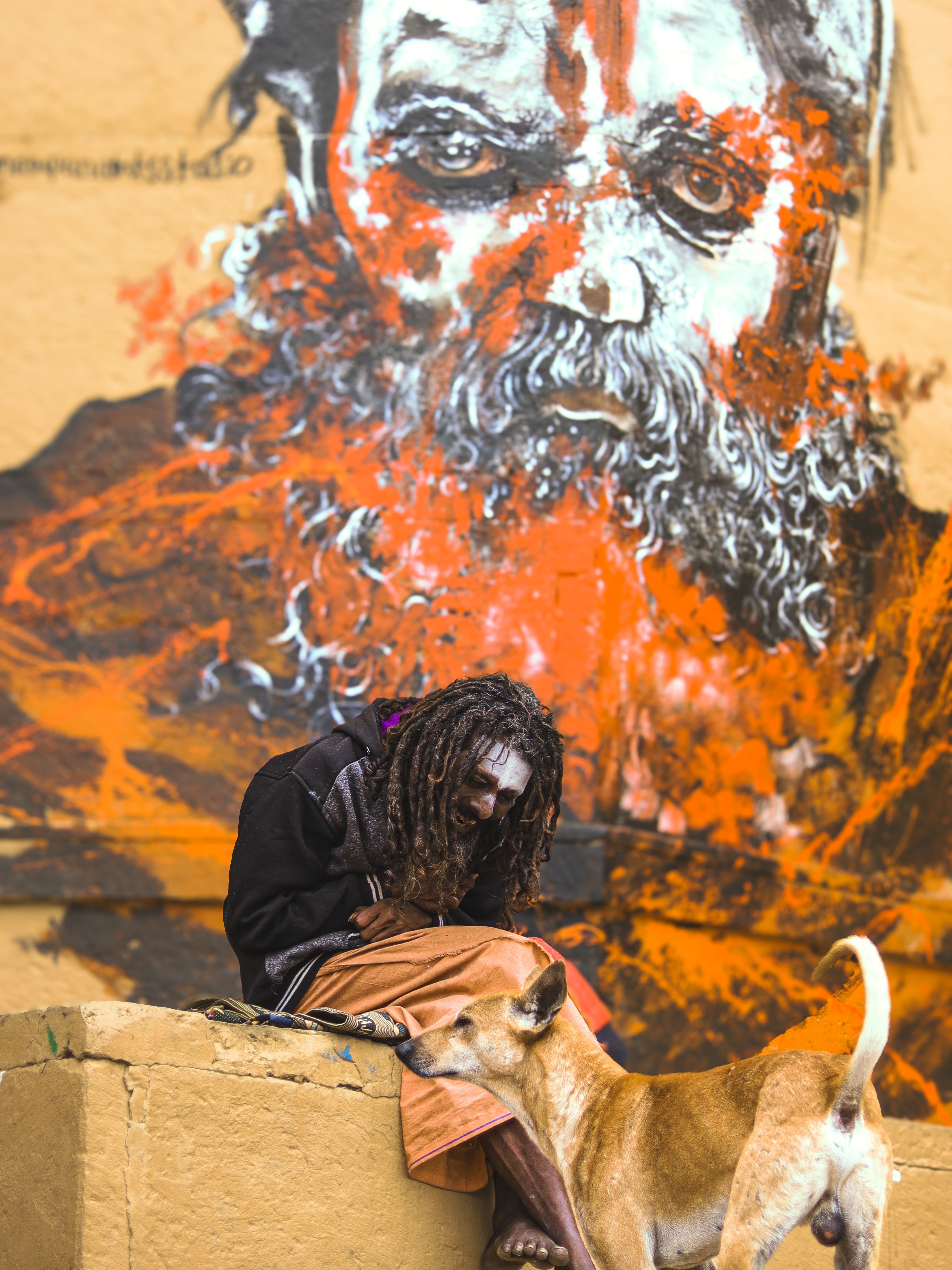 Holy Man with Dog in Varanasi Street Art Scene · Free Stock Photo