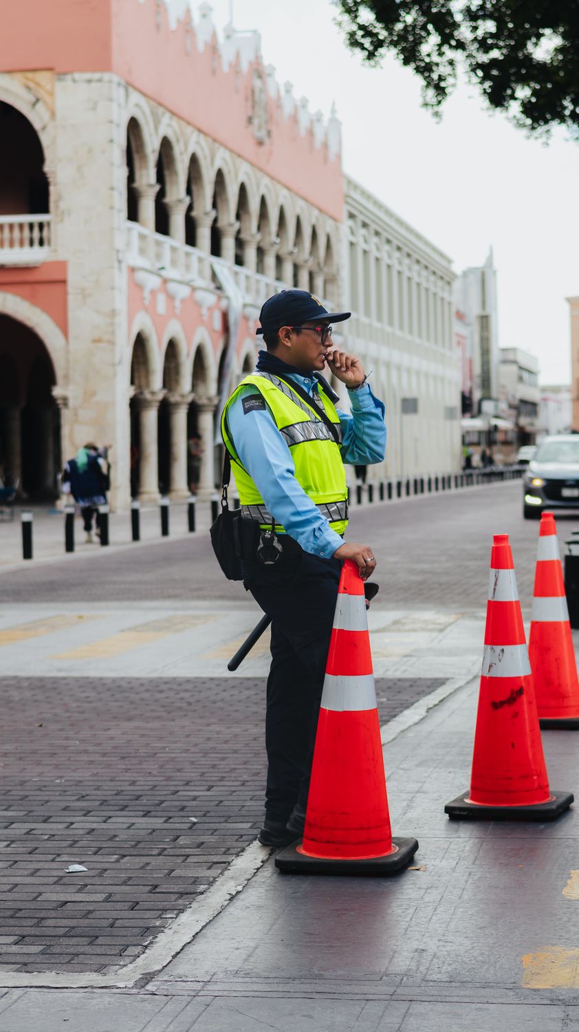 Traffic Director Traffic Police Officer Directing Street in Urban Area · Free Stock Photo